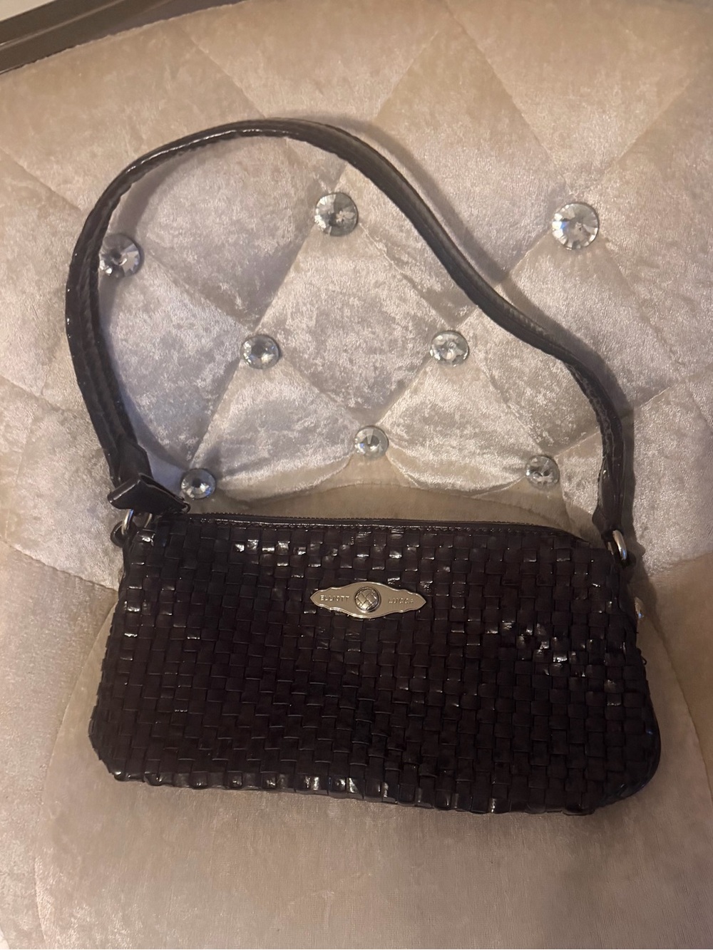 Elliott Lucca Glossy Black Woven Wristlet with Logo Plate